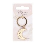 Llavero dorado con forma de media luna y diseño de fases lunares, presentado sobre tarjeta decorativa